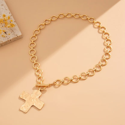 Notable Hammered Cross Front Toggle Necklace